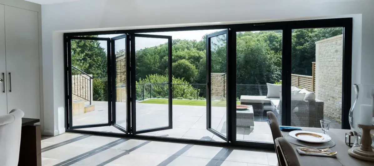 192 in. x 80 in. Center Opening Outswing Black Aluminum Folding Patio Door - Image 10